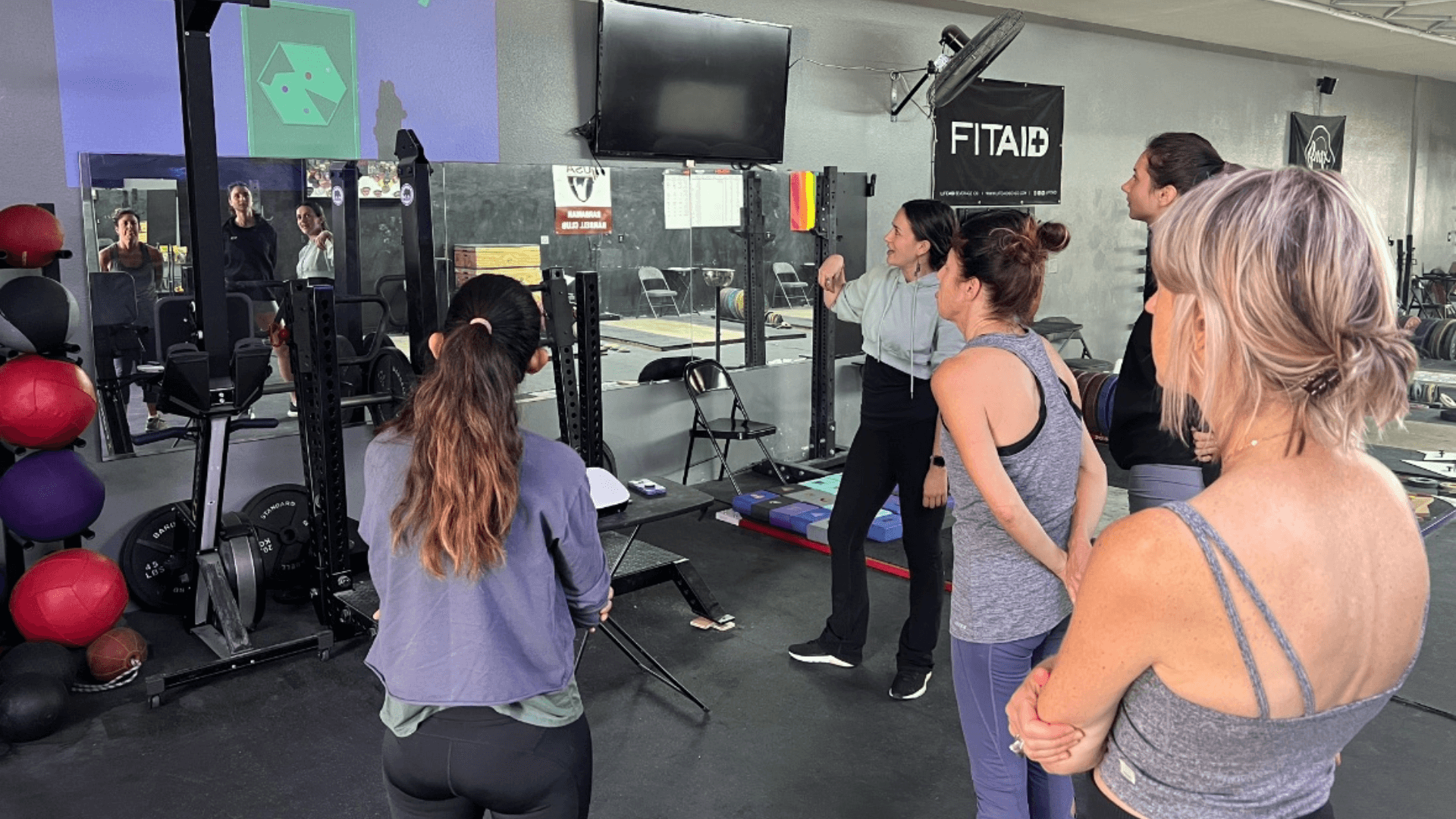 REVO class instruction in a gym